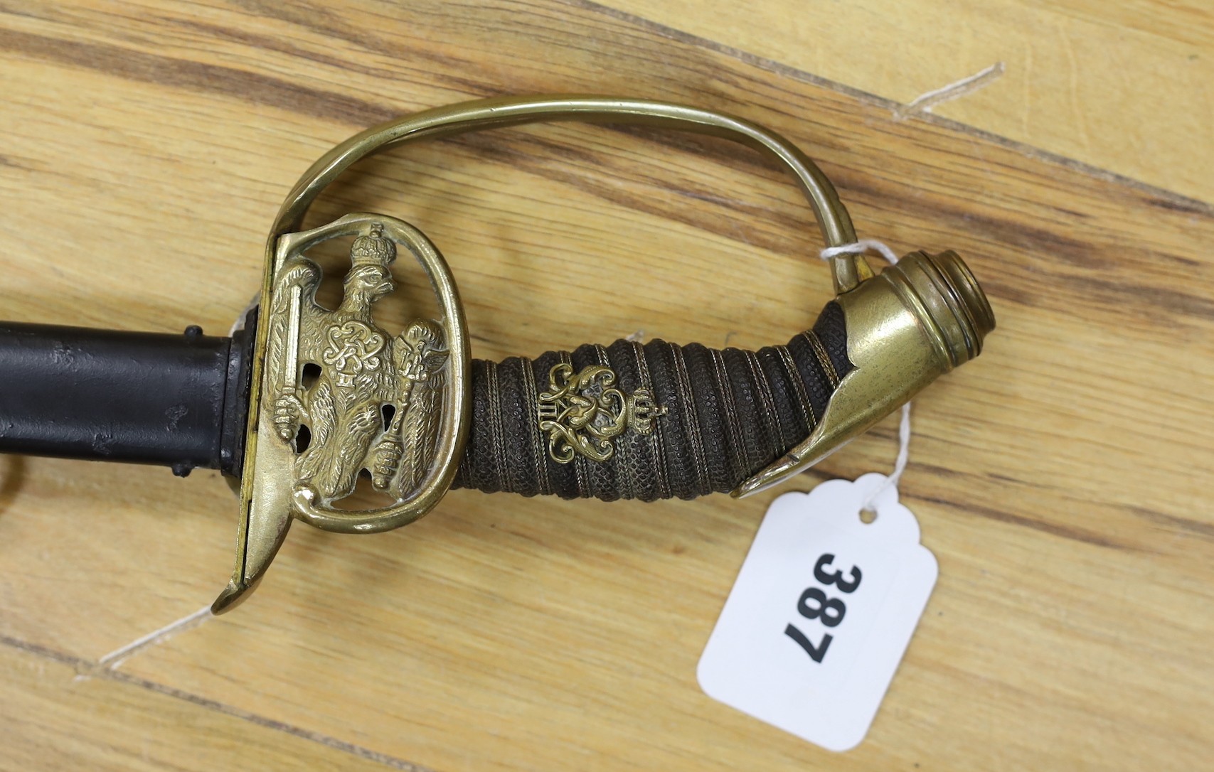 A late 19th century Imperial German/Prussian infantry officer's sabre and scabbard 97cm total length